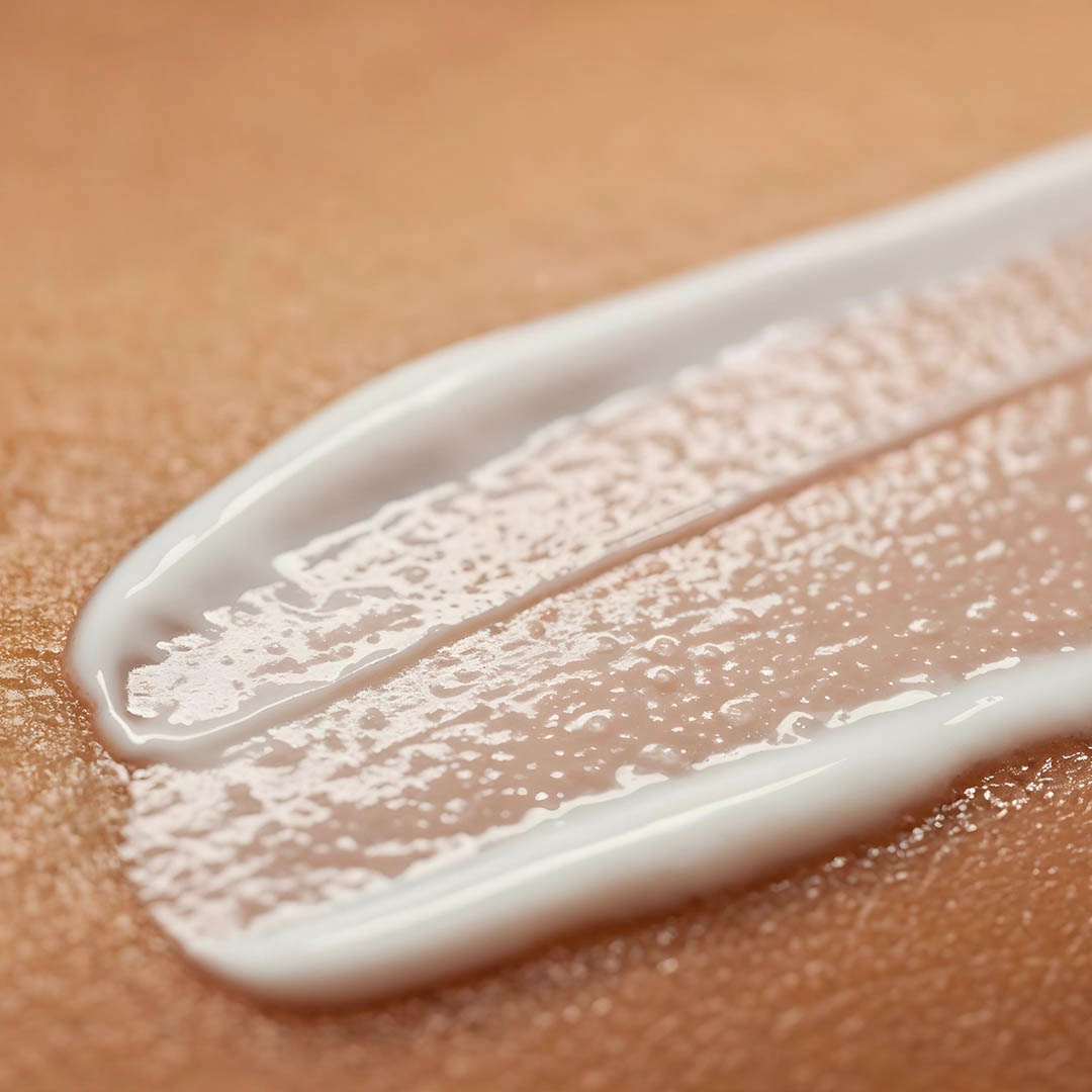 Close-up af creme på hud