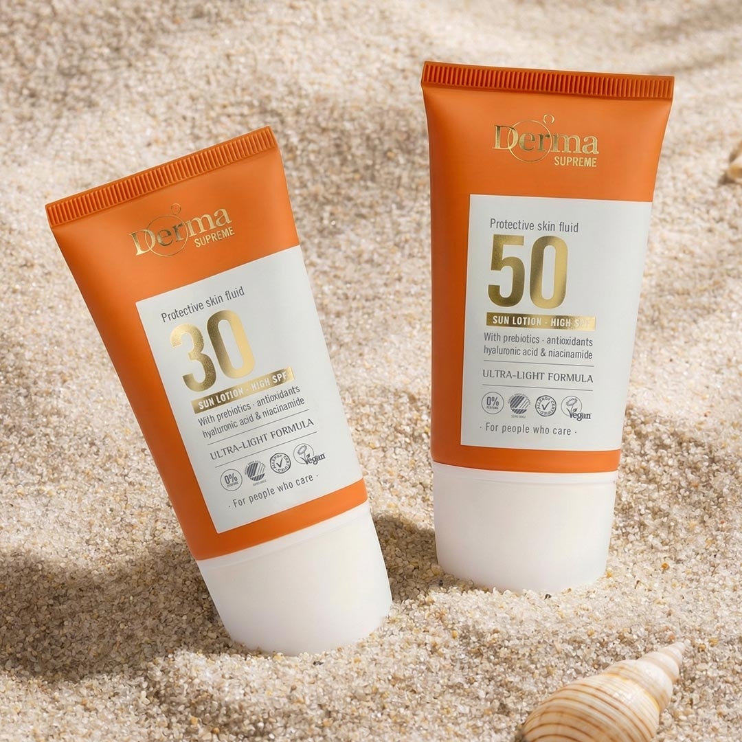 Derma Supreme Fluid Ansigtssolcreme SPF30 og SPF50 i strandsand med konkylie og muslingeskaller
